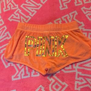 PINK Victoria's Secret Vibrant Orange Shorts with Gold Logo